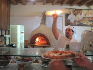 A Pizzaiolo Working at Gusta Pizza
